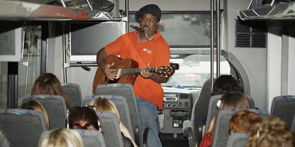 Chicago blues tour with jazz Chicago Detours musician bus student performance group in Chicago