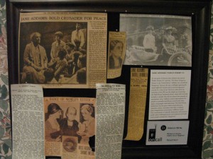 Hull House newspaper clippings bulletin board