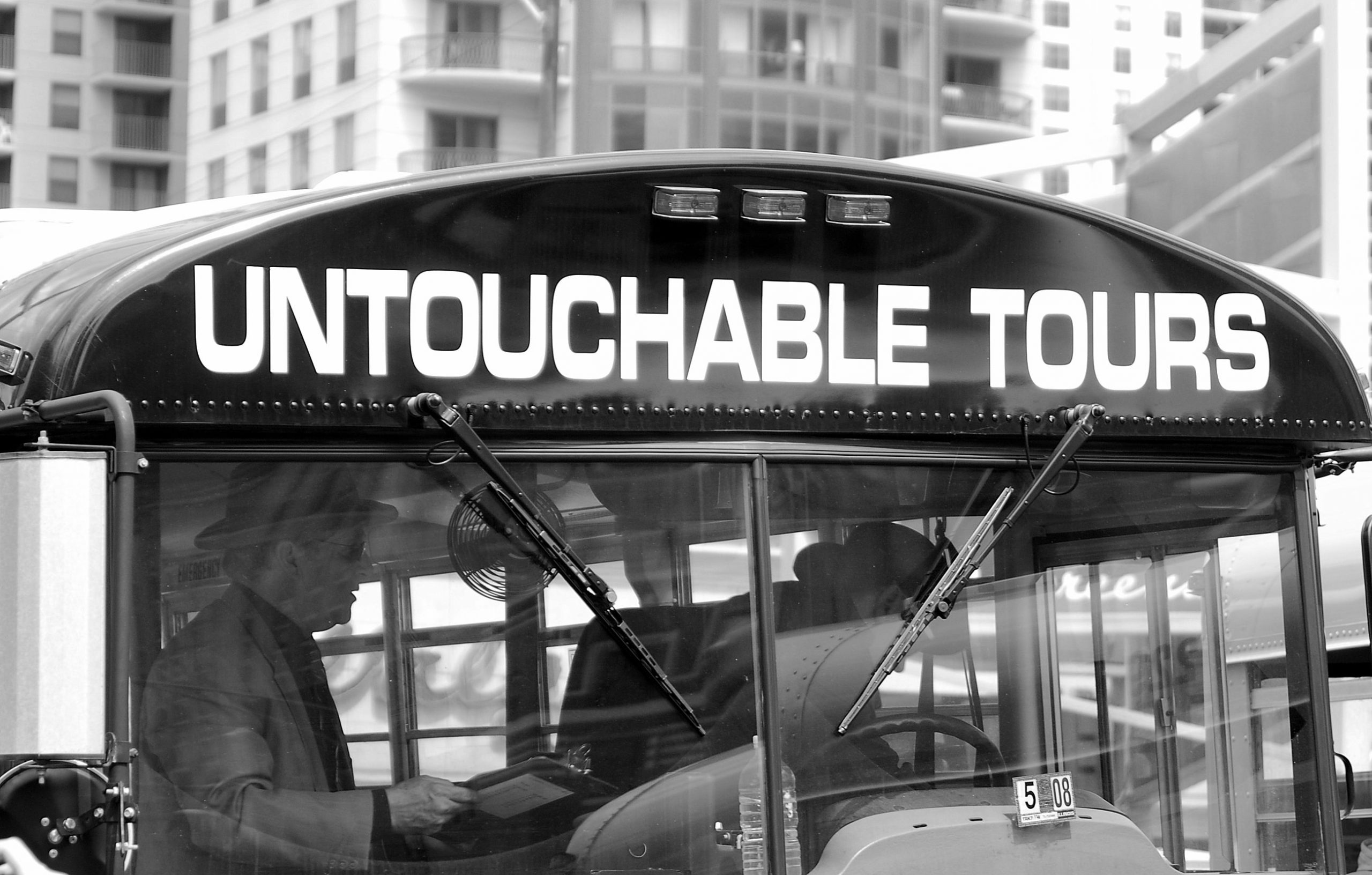 Untouchable Tour gangster tour bus